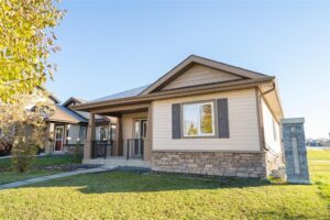 Bridgwater Lakes bungalow for sale in Winnipeg with park view, deck, and double detached garage